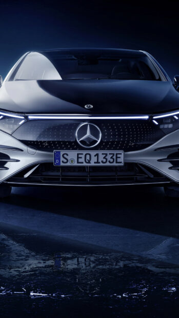 The Mercedes Benz Eqs displays its sleek front grille and headlights in a night setting, HD Phone Wallpaper