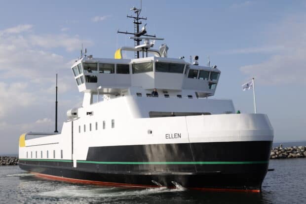 A modern ferry named Ellen is sailing on calm water under a partly cloudy sky, 2K Desktop Wallpaper