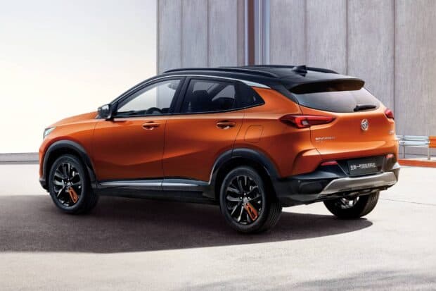 The Buick Encore showcases a stylish rear side profile in orange, HD Desktop Wallpaper