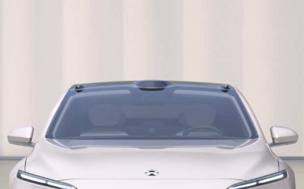 A modern sleek Nio electric car is shown from the front with clear windshield and side mirrors, 2K Desktop Wallpaper
