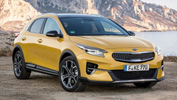 A stylish Kia Wallpapers vehicle in a natural setting, HD Desktop Wallpaper
