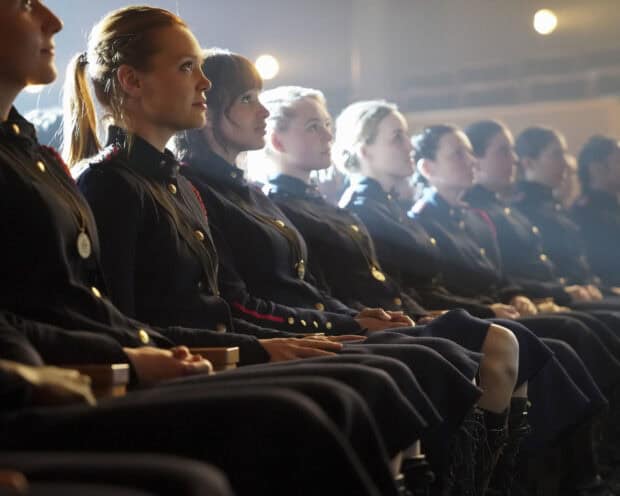 Women in uniform sitting attentively in a row from Motherland Fort Salem tv series, 2K Desktop Wallpaper