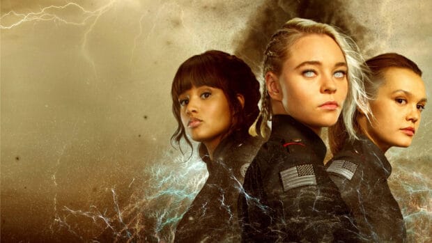 Three women stand together in a stormy setting from Motherland Fort Salem tv series, 2K Desktop Wallpaper