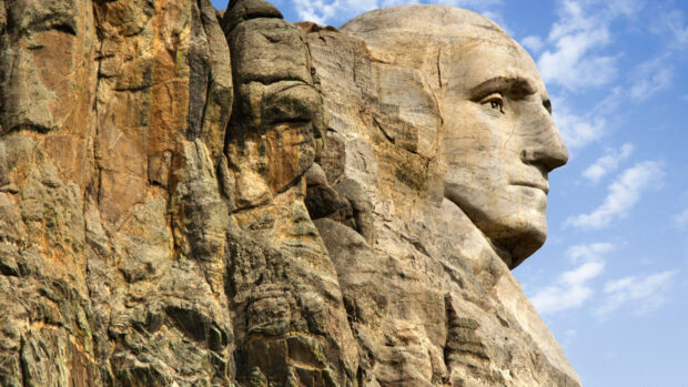 The sculpted faces on Mount Rushmore are carved in granite rock, 2K Desktop Wallpaper