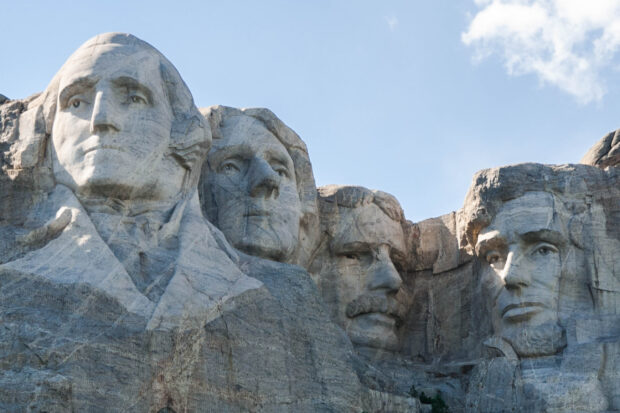 A detailed view of the Mount Rushmore sculpture showing the four presidents carved into the mountain, 2K Desktop Wallpaper