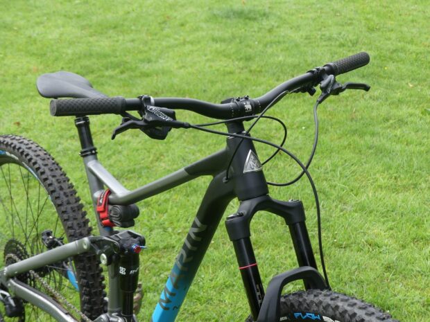 A close up view of a Marin Bikes mountain bike on green grass, HD Desktop Wallpaper