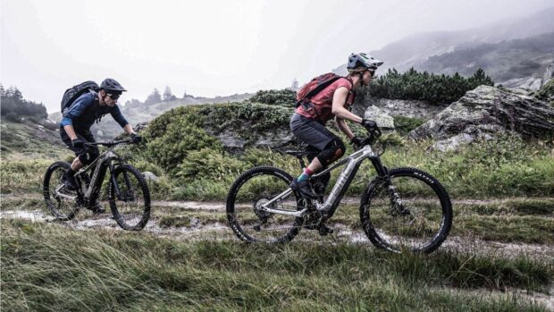 Two riders enjoying an outdoor mountain trail with Bmc Bikes in nature, HD Desktop Wallpaper