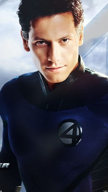 Mr Fantastic wallpapers shows a close up of a man in a blue superhero suit with the number four emblem, HD Phone Wallpaper