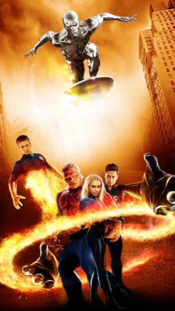 The Mr Fantastic Wallpapers team is shown in an intense action pose with fire and city buildings, 2K Phone Wallpaper