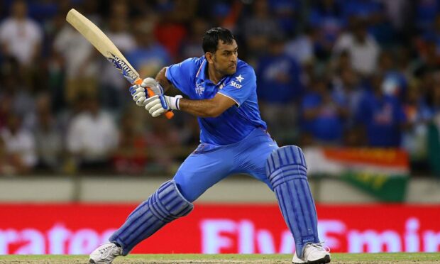 Ms Dhoni The Untold Story wallpapers showing the player in action with bat, HD Desktop Wallpaper