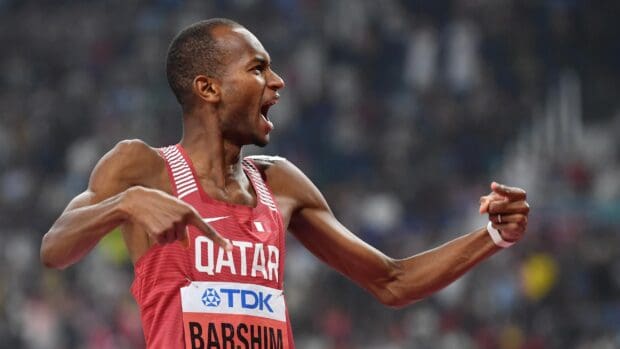 Mutaz Essa Barshim is celebrating his win in a high jump competition, 2K Desktop Wallpaper
