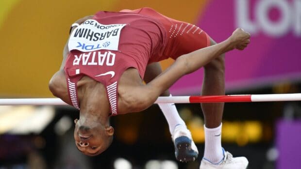 Mutaz Essa Barshim is captured in mid air during a high jump competition, HD Desktop Wallpaper (1)