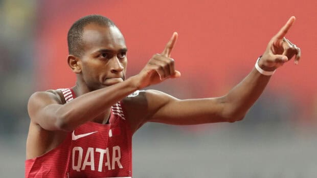 Mutaz Essa Barshim is seen celebrating during a track and field event, HD Desktop Wallpaper