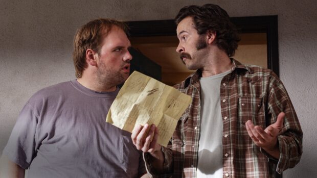 Two men discussing a paper in a scene from My Name Is Earl TV series, 4K Desktop Wallpaper