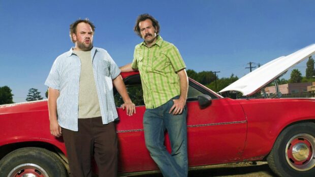 Two men from My Name Is Earl TV series pose near a red car, HD Desktop Wallpaper