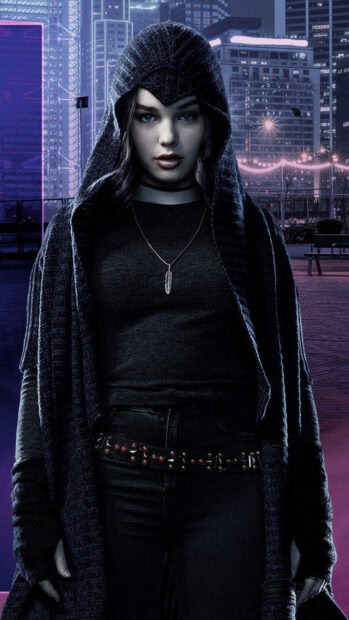 A mysterious character from Titans Tv Series wearing a dark hooded cloak in the city at night, 2K Mobile Wallpaper