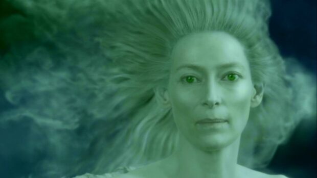 A close up of Tilda Swinton with green eyes underwater, HD Desktop Wallpaper