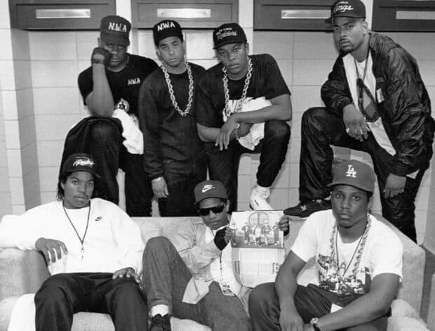 The NWA group poses in a classic black and white photo showcasing their iconic style and attitude, HD Desktop Wallpaper