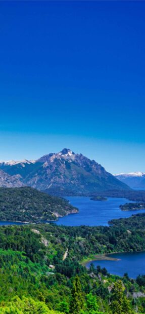 The Nahuel Huapi lake and mountain are visible under the clear blue sky, 2K Mobile Wallpaper