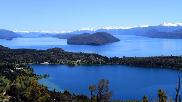 A scenic view of Nahuel Huapi with blue lakes and snowy mountain peaks, HD Desktop Wallpaper