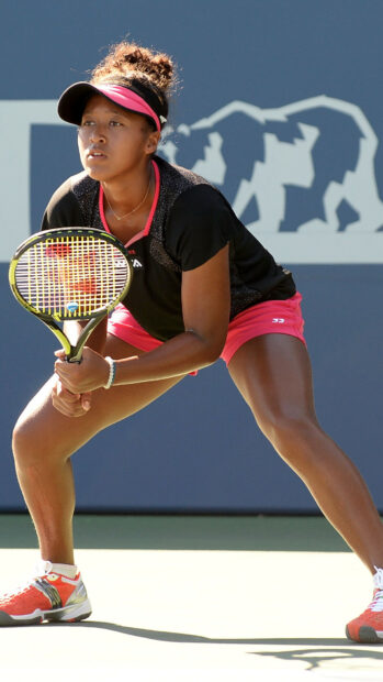 Naomi Osaka focused and ready to hit the ball on the tennis court, HD Mobile Wallpaper