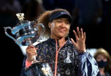 Naomi Osaka proudly holds a championship trophy with a smile, HD Desktop Wallpaper