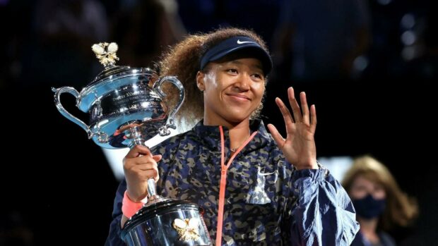 Naomi Osaka proudly holds a championship trophy with a smile, HD Desktop Wallpaper