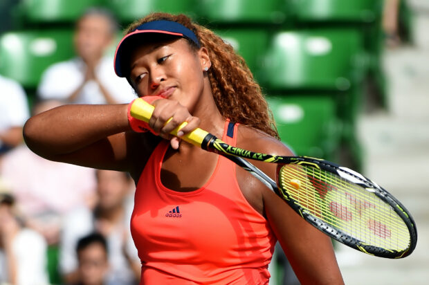 Naomi Osaka shows determination with her tennis racket, 2K Desktop Wallpaper