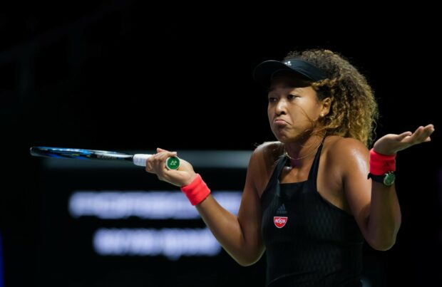 Naomi Osaka shows a confused reaction during a tennis match, HD Desktop Wallpaper