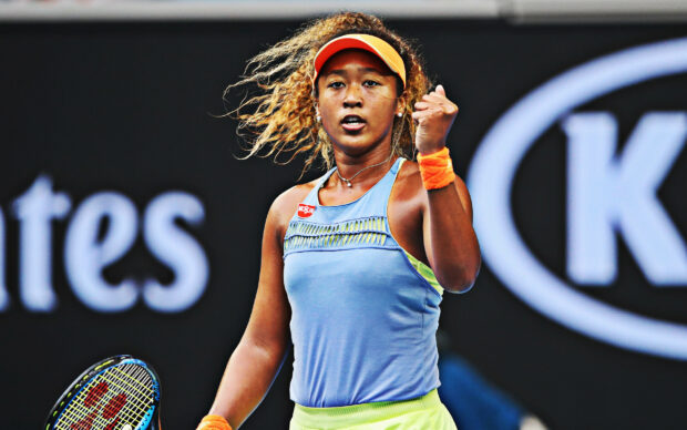 Naomi Osaka displays determination and focus during a tennis match, 2K Desktop Wallpaper