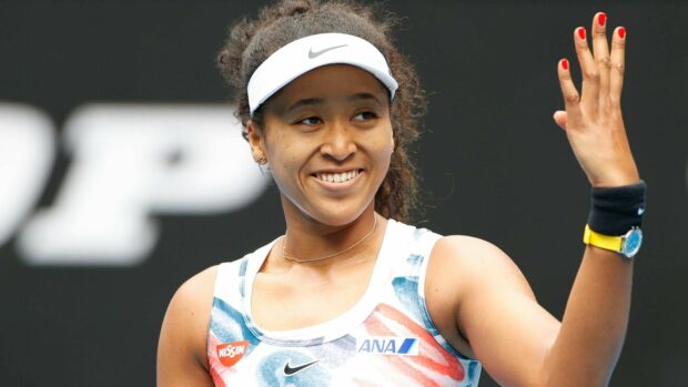 Naomi Osaka smiles and waves her hand in a tennis match, HD Desktop Wallpaper