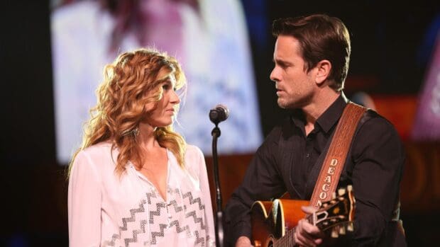 A man plays guitar while a woman listens during a Nashville TV series moment, HD Desktop Wallpaper