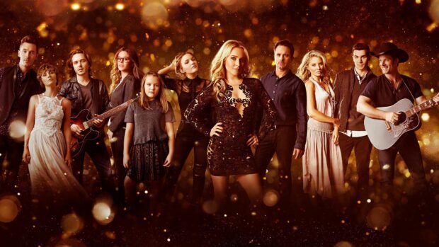 The Nashville TV series cast poses in stylish outfits against a glowing background, HD Desktop Wallpaper