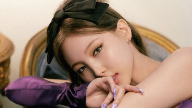 Nayeon Wallpapers showing a close up portrait with a black bow and purple outfit, HD Desktop Wallpaper