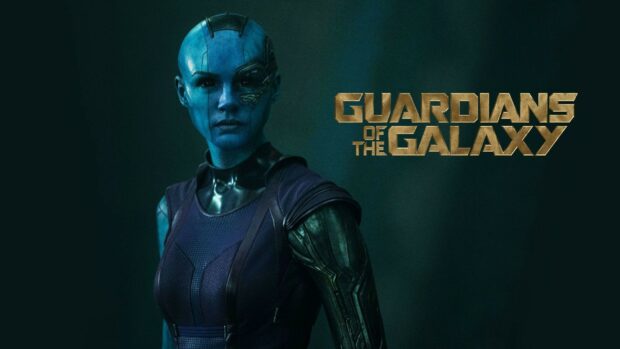 Nebula stands with a serious expression in a dark scene from Marvels Guardians Of The Galaxy, HD Desktop Wallpaper