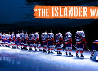 The New York Islanders players line up on an ice rink under spotlight, 2K Desktop Wallpaper