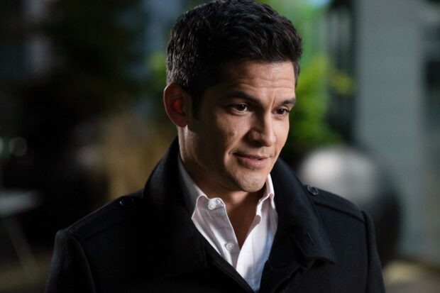 Nicholas Gonzalez looks thoughtful in a dark coat during an outdoor scene, HD Desktop Wallpaper