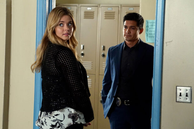 Nicholas Gonzalez wallpapers show him speaking with a woman near lockers, 2K Desktop Wallpaper