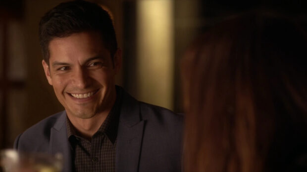 Nicholas Gonzalez Wallpapers smiles warmly in a dimly lit setting, HD Desktop Wallpaper