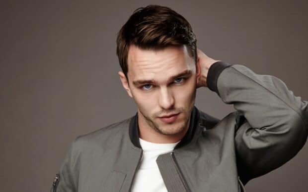 Nicholas Hoult looks directly at the camera with a serious expression, HD Desktop Wallpaper