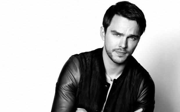 Nicholas Hoult looks thoughtfully into the camera wearing a jacket, HD Desktop Wallpaper