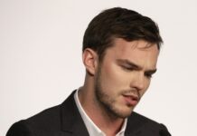 A close up of Nicholas Hoult looking serious and thoughtful, 4K Desktop Wallpaper