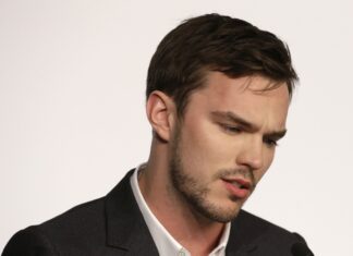 A close up of Nicholas Hoult looking serious and thoughtful, 4K Desktop Wallpaper