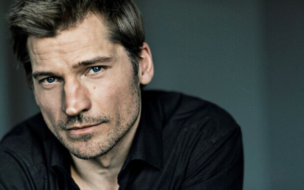 A close up portrait of Nikolaj Coster Waldau with blue eyes and a serious expression, HD Desktop Wallpaper
