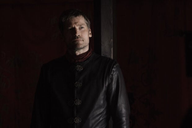 Nikolaj Coster Waldau stands in dim lighting wearing a dark leather jacket with metal clasps, HD Desktop Wallpaper