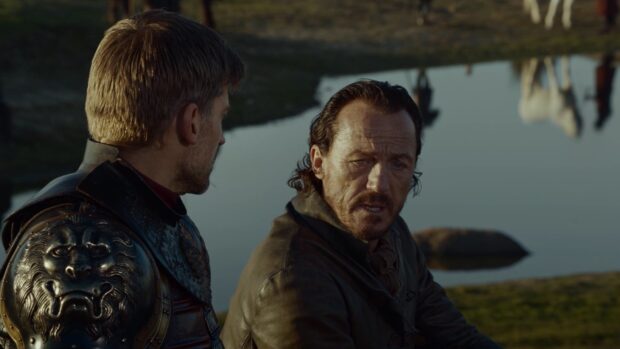 Two men talk near a pond with horses in the background featuring Nikolaj Coster Waldau, HD Desktop Wallpaper