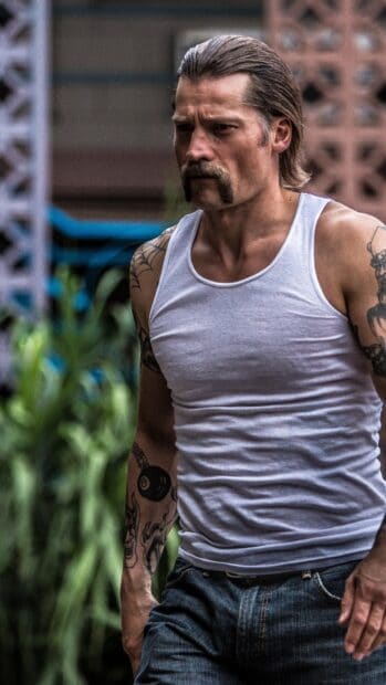 Nikolaj Coster Waldau shows off his tattoos wearing a white tank top, HD Mobile Wallpaper