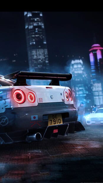 A Nissan GT R is parked on a wet street with glowing taillights and skyscrapers in the background, 4K Phone Wallpaper