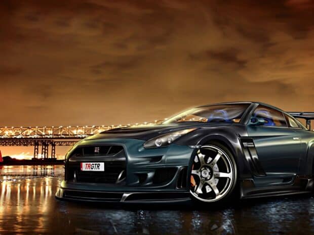 A sleek Nissan GT R is parked near a brightly lit bridge at dusk, 2K Desktop Wallpaper