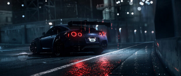 A Nissan GT R is parked on a rainy street with glowing taillights reflecting on the wet pavement, 2K Desktop Wallpaper